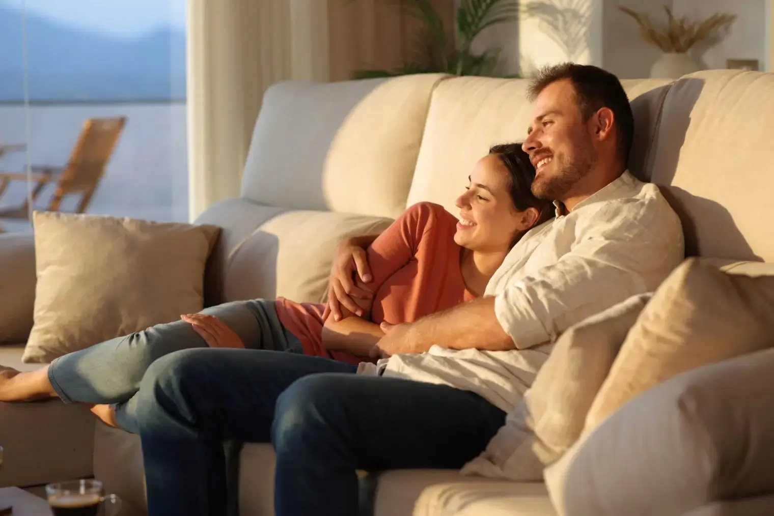 Couple relaxing at home at Kinward at Two Rivers, Zephyrhills homes for rent